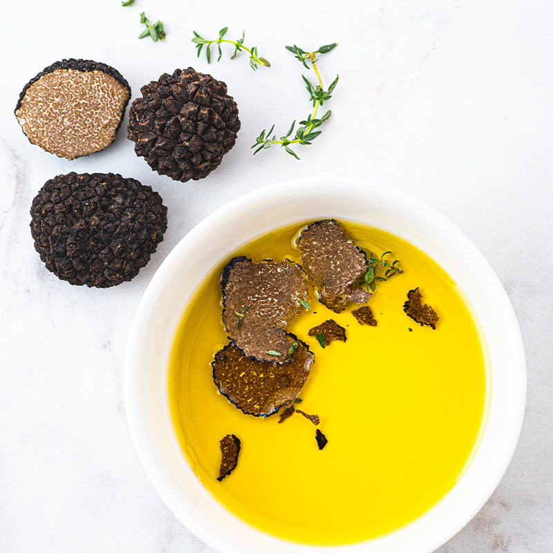Ricette e utilizzo olio al tartufo nero del Lazio per condimenti gourmet